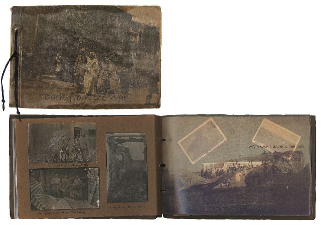 Back from the War
6.5'' x 9.5'' Side sewn rebound antique photograph album with paper backed cloth-wrapped cover. The original pages, with faded photographs of WWI, were with interleaved with sheer vellum pages, containing details from the photographs and text from a poem by Wilfred Gibson.