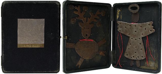 Tis the season
7.75" x 6" A two page book/ leatherette box containing collaged metal figures of reindeer and angel with red raffia.