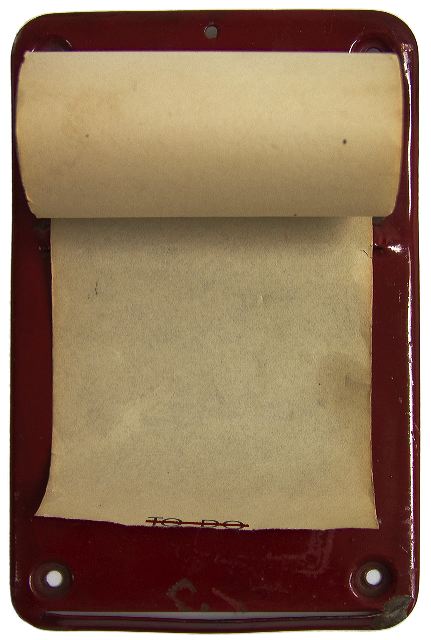 To Do
5.5” x 3.5” x 1.75” A vintage metal stand with a roll of paper, (of unknown length), for making grocery lists became “To Do”. Rub-on letters, crossed out, were added across the bottom of the paper roll as both a title and a commentary on making lists.